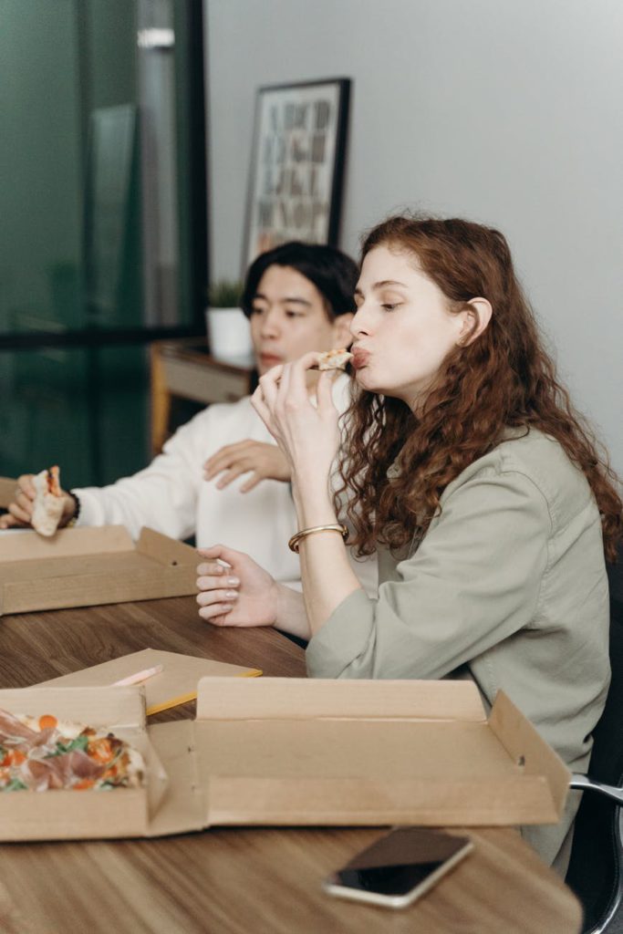 people eating pizza