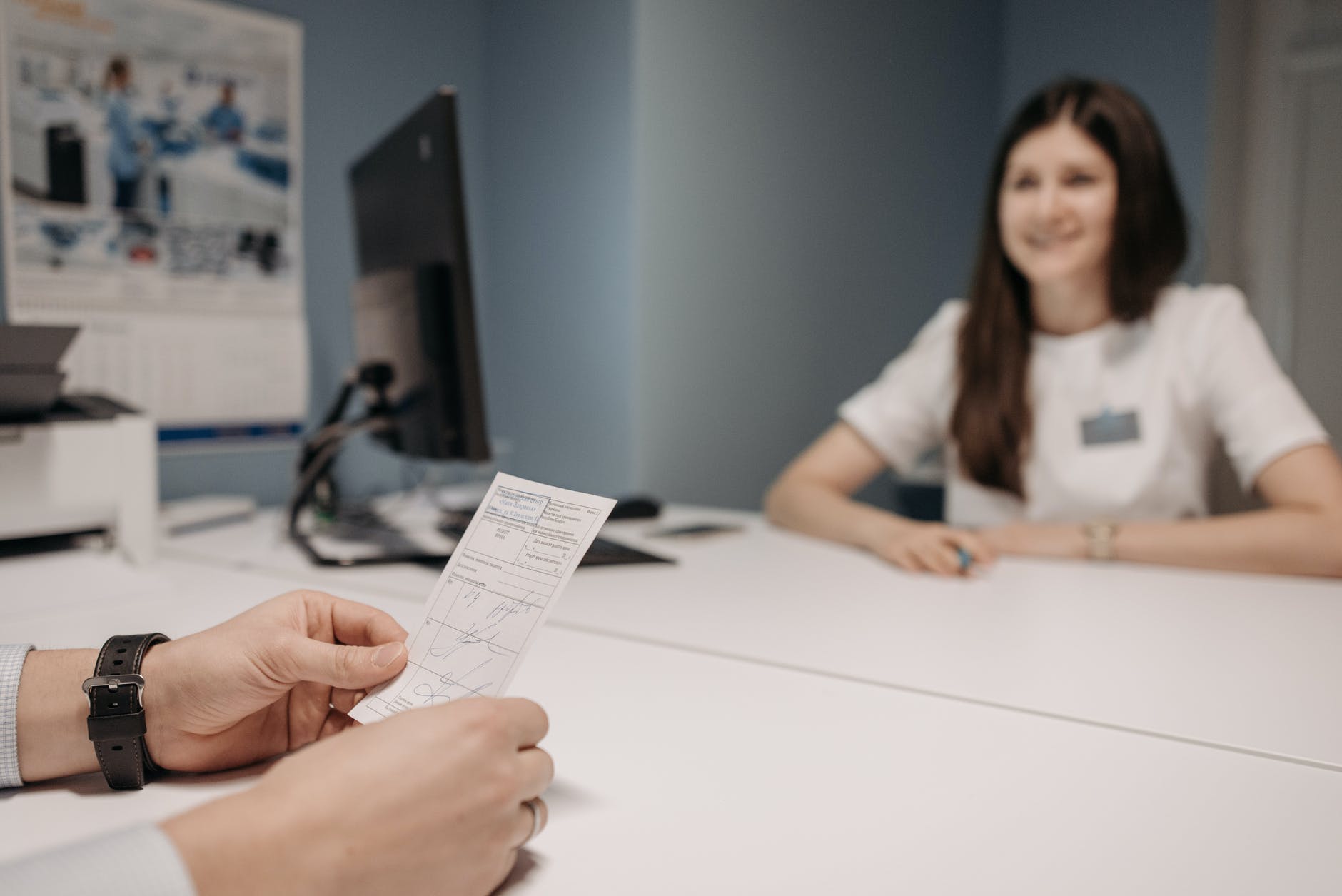 person holding a medical prescription