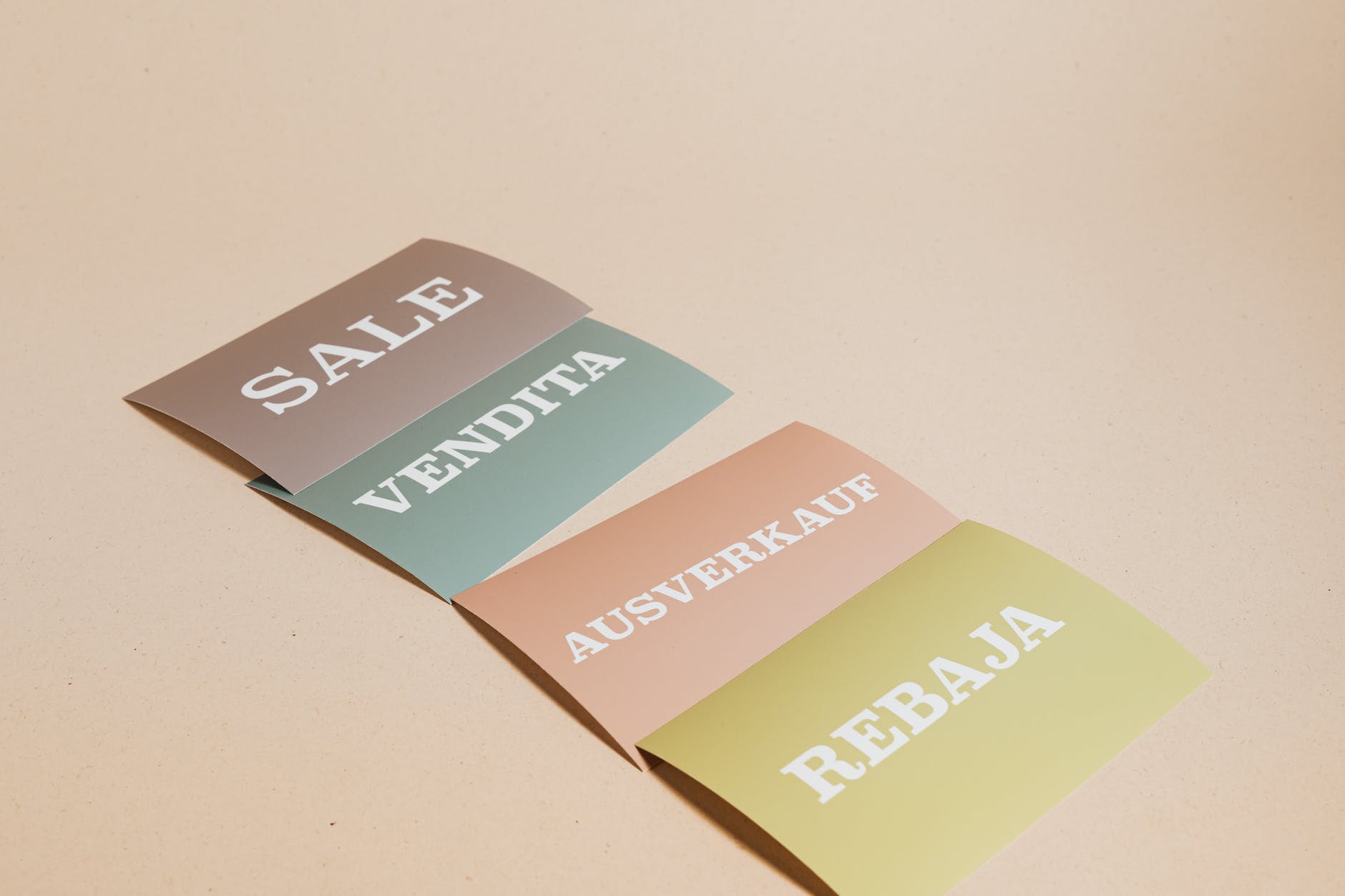 sale cards on beige background