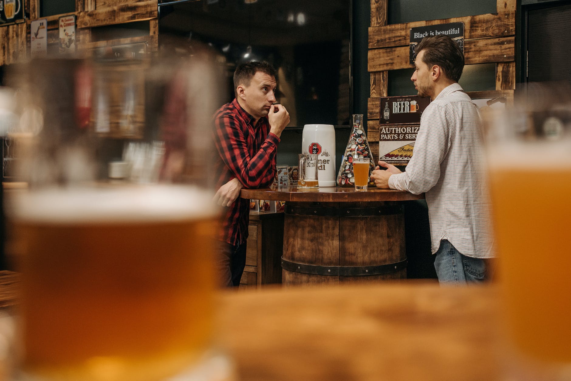 men hanging out at a bar