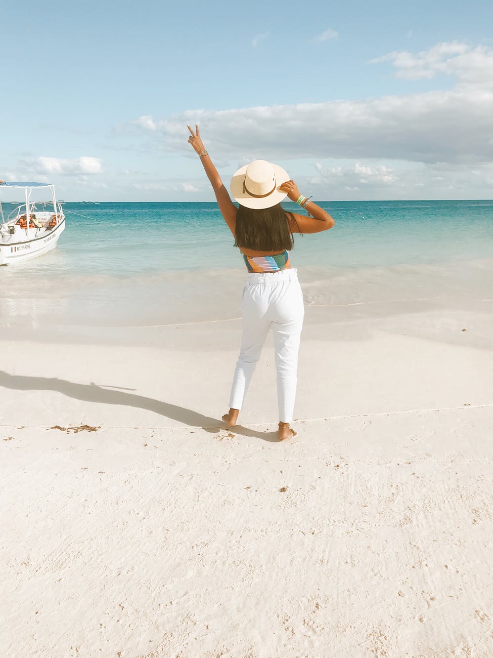 back view of woman on seashore
