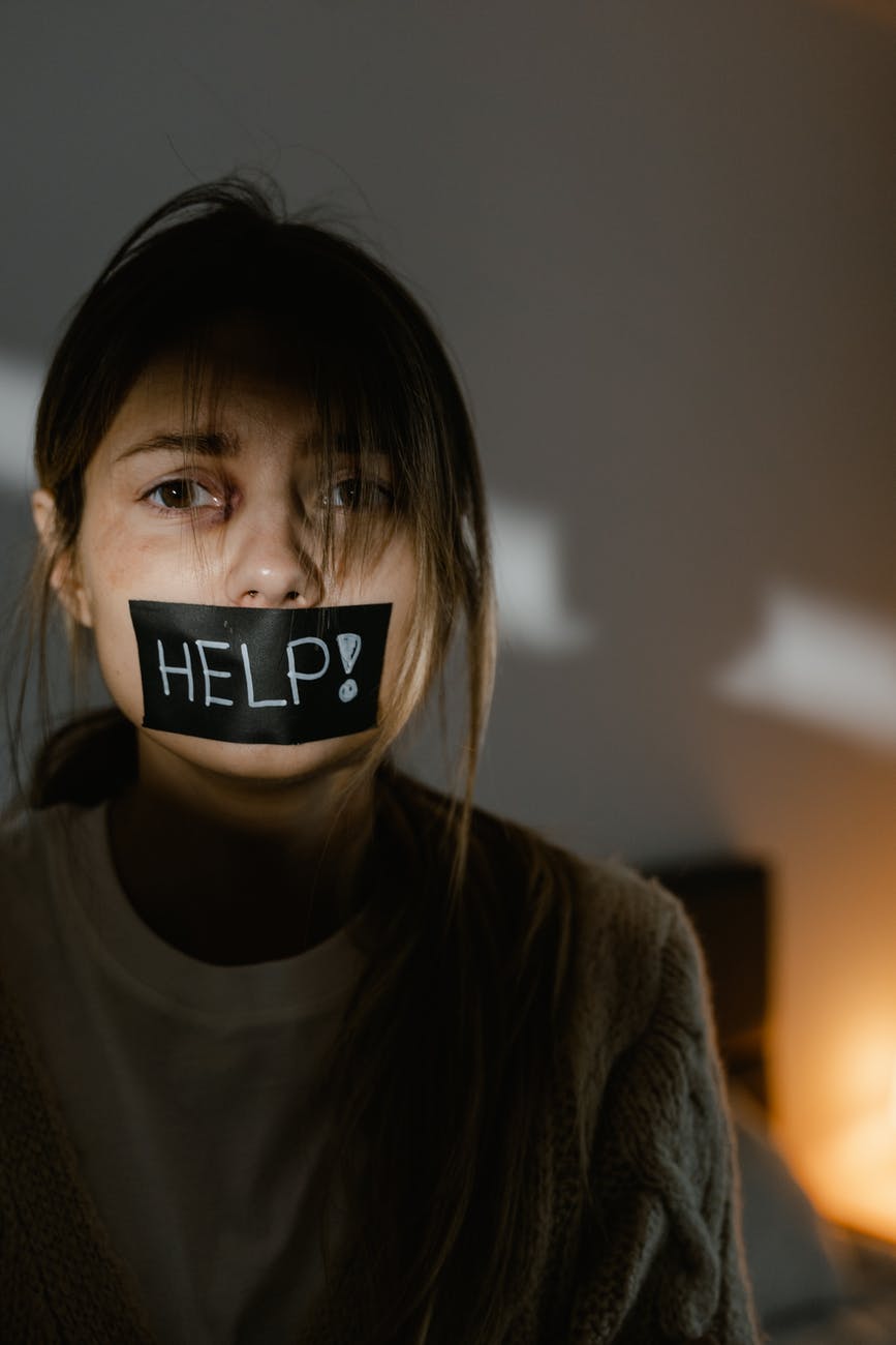 woman in the dark asking for help
