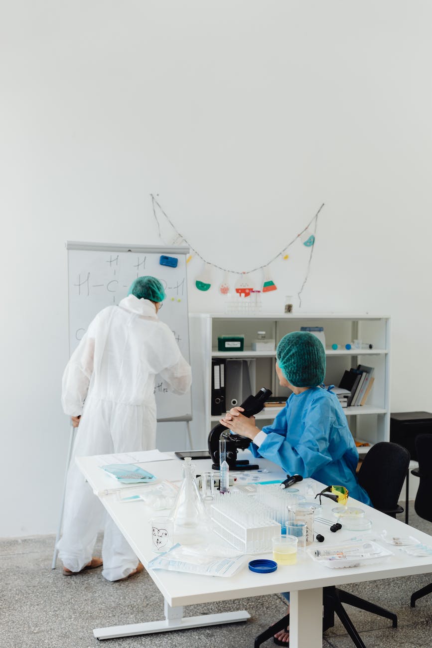 scientists in lab coat doing research