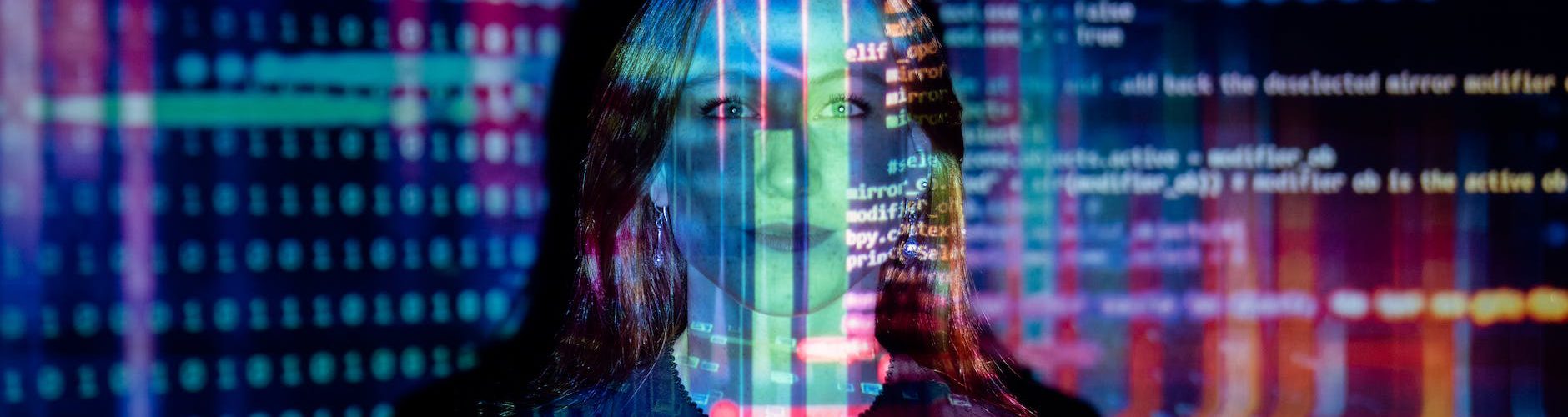 code projected over woman